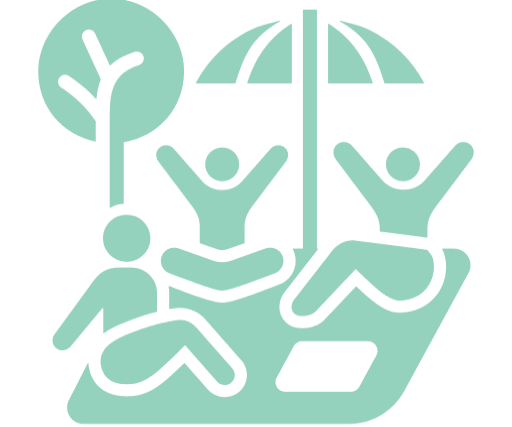Three people sitting and relaxing outdoors under a tree and an umbrella, with one person on the ground and two people raising their arms.